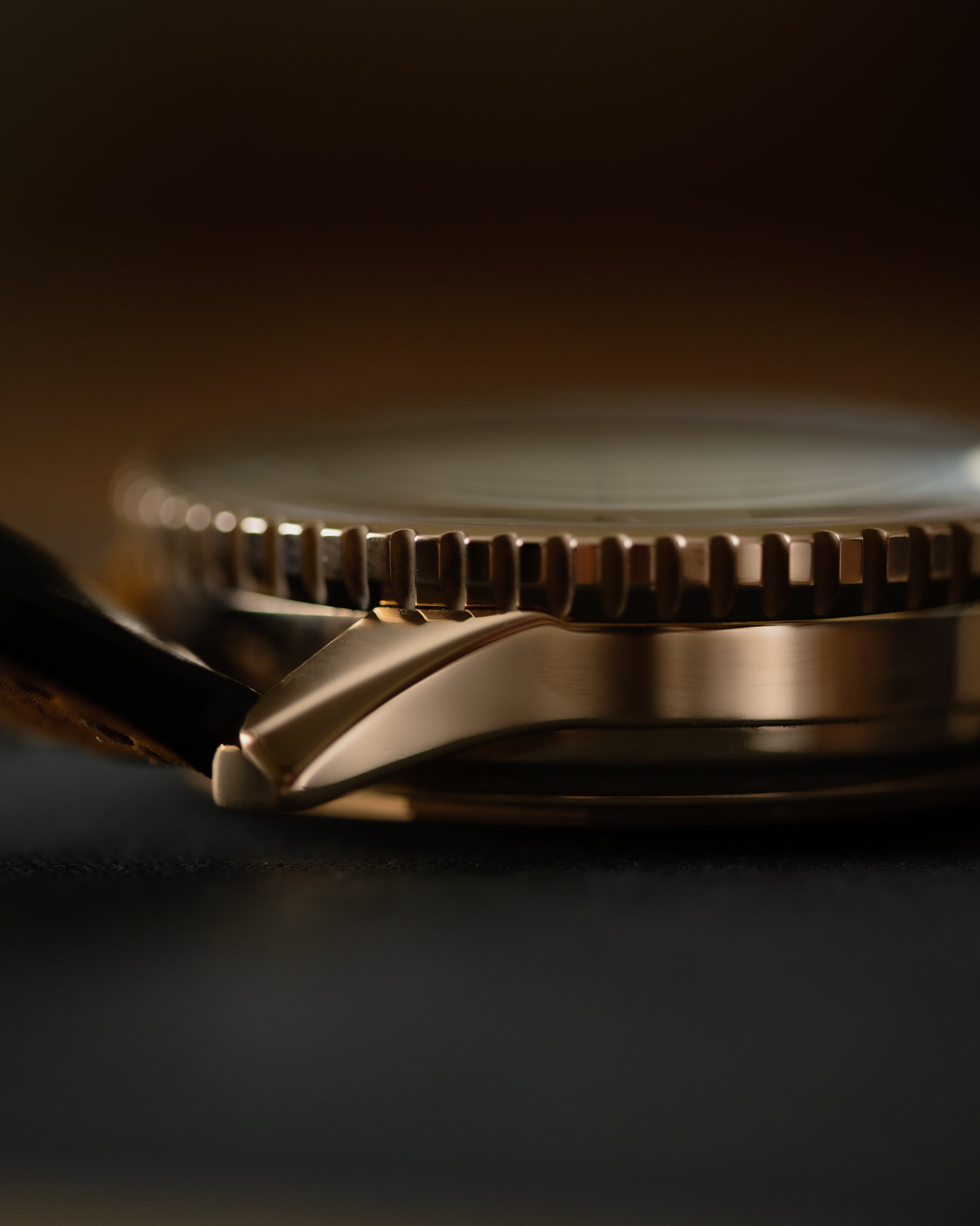 a gold case breitling and the bezel