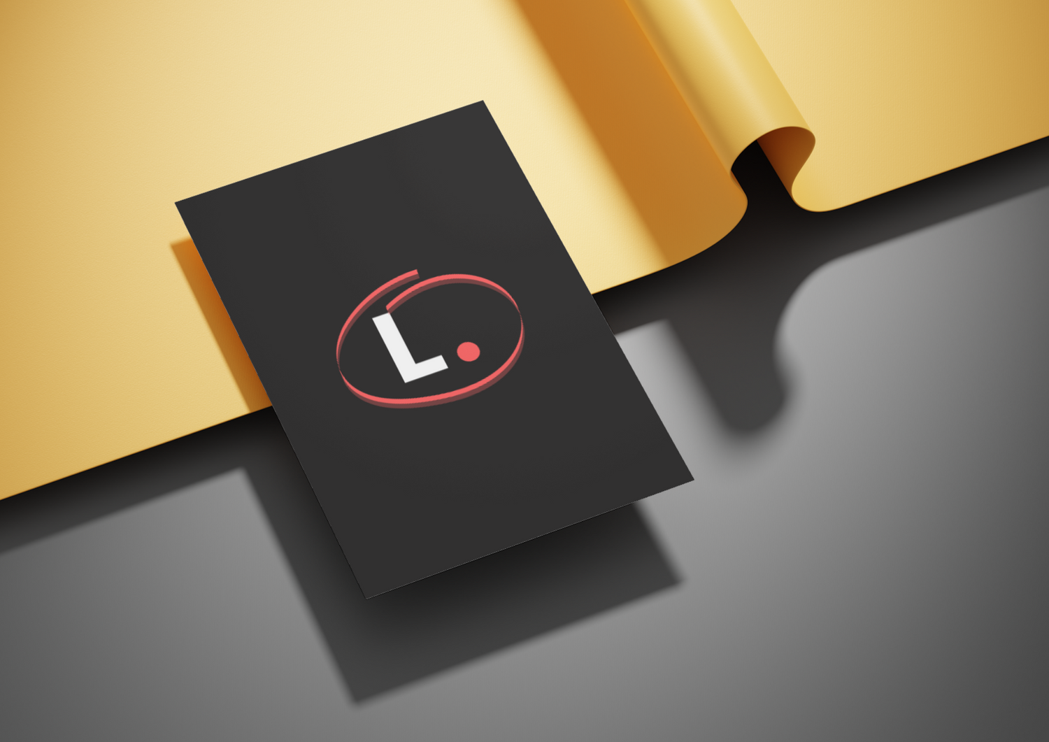 a business card laying on top of some yellow paper