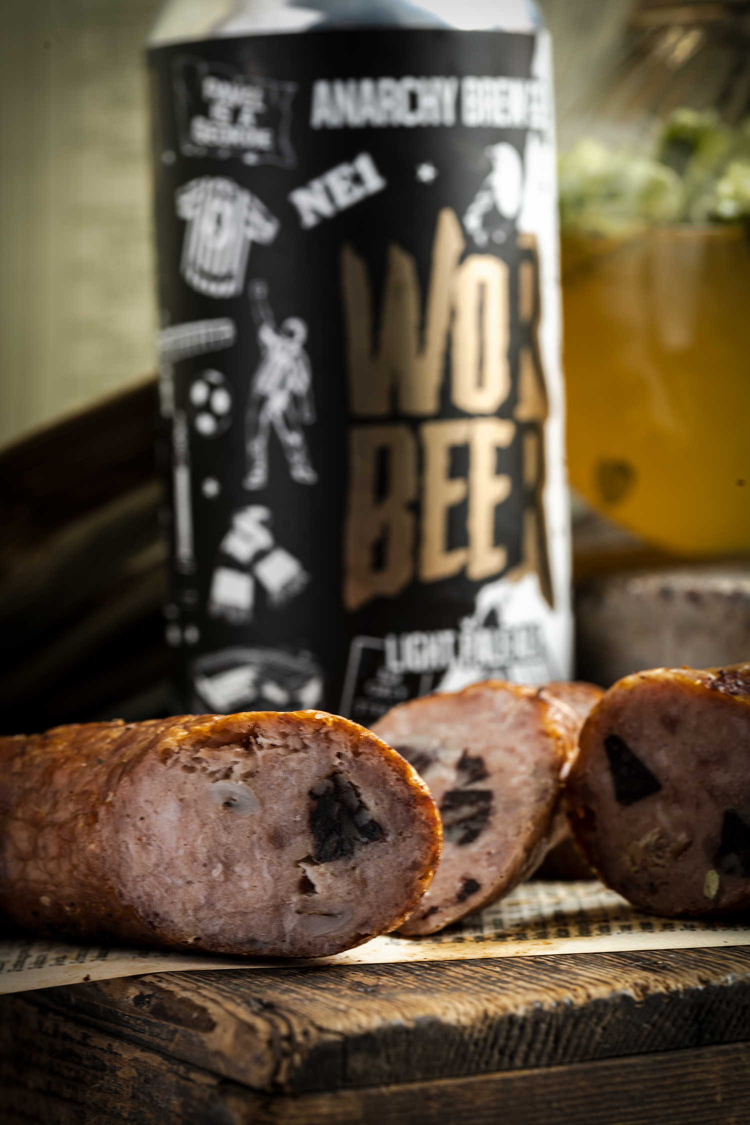 wor beer sausages with a can of wor beer