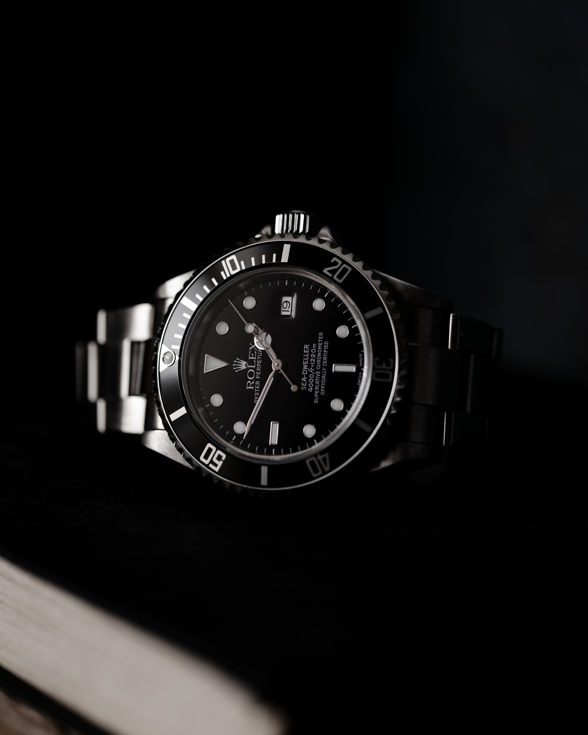 Rolex Sea-Dweller on a dark background
